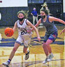 Junior guard Annali Silver drives past a Madison defender during a home game on Thursday, Jan. 21. Silver registered a pair of defensive rebounds and assists in 13 minutes played as the Mountaineers downed visiting Madison 56-24. (MNJ photo/Cory Spiers)