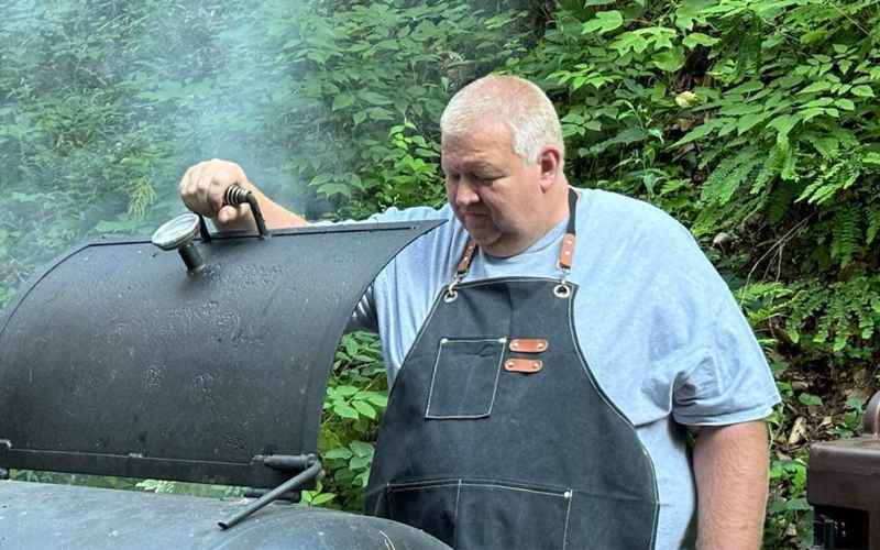Photo submitted. Mitchell County hosts Fourth of July celebrations this week. Adam Wheeler, shown, will be selling barbecue at both the Bakersville (Thursday) and Spruce Pine (Saturday) celebrations.